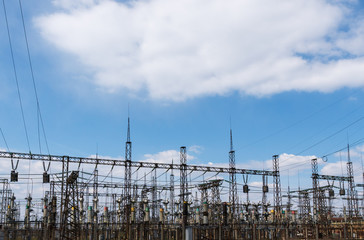 High power electricity poles in urban area. Energy supply, distribution of energy, transmitting...