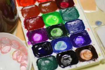 colorful paints in a box