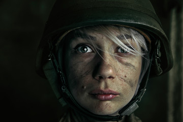 Portrait of young female soldier
