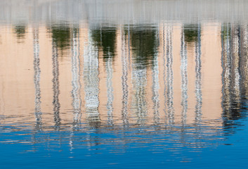 reflected buildings in the water