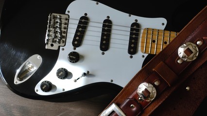 electric guitar and guitar straps . closeup