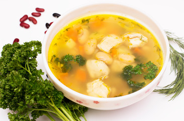 Bean soup with chicken. View from above on a white background