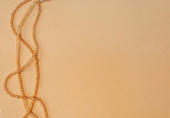 Handmade Wood Collar Necklace on a Colored Background