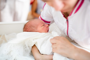 Newborn baby. Little child in medicine hospital. Medical health care. Doctor pediatrician. Small kid, infant in clinic. Healthy little kid shortly after birth