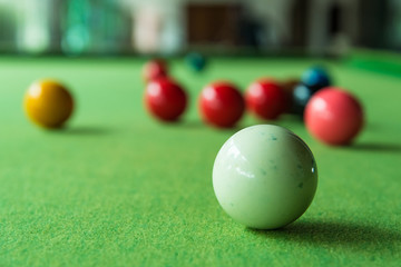 Close up snooker ball on the green snooker table.