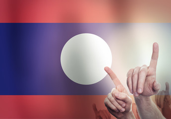 Hands on the background of the Laos flag. Freedom concept