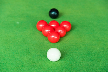Close up snooker ball on the green snooker table.