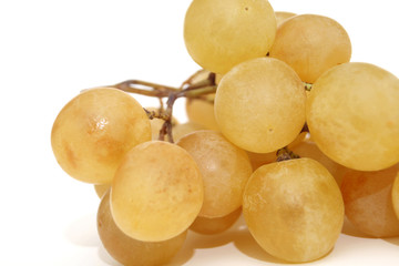 Fresh yellow grape isolated on white background