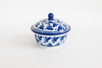 Porcelain white pottery bowl draw a leaf blue pattern with lid art style asian on white background isolated