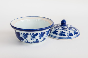 Porcelain white pottery bowl draw a leaf blue pattern with lid art style asian on white background isolated
