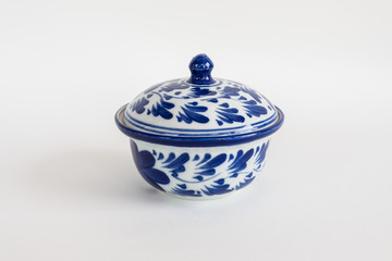 Porcelain white pottery bowl draw a leaf blue pattern with lid art style asian on white background isolated