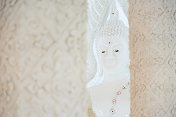 White Buddha statue in Church of Huai Pla Kung Temple.Chiang Rai, Thailand.