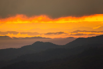 Sunrise.Mountain valley during sunrise. Natural summer landscape.Lighting before sunrise at the morning time.Thailand.
