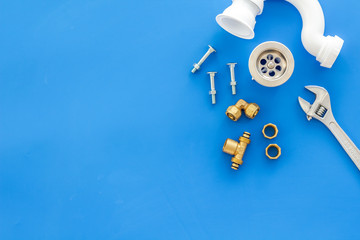 Plumber work with instruments, tools and gear on blue background top view mockup