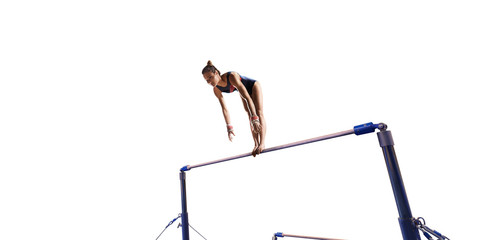 Female athlete doing a complicated exciting trick on horizontal gymnastics bars on white background. Isolated Girl perform stunt in bright sports clothes