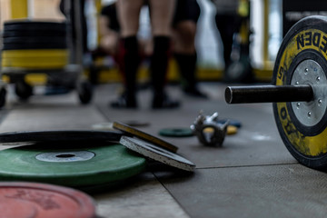 closeup of weights on the floor of a gym