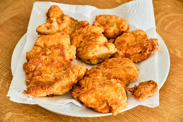 Preparing chicken meat schnitzel