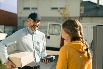 Express courier delivering a box