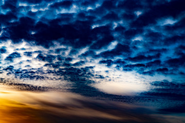 Fototapeta na wymiar mystically blue clouds at sunset