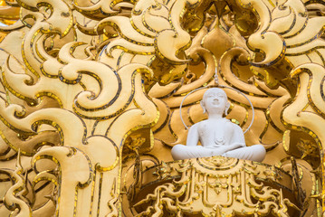 White monk statue at white temple Wat Rong Khun, Chiangrai, Thailand.