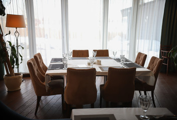 Modern bright cafe with big windows in the city