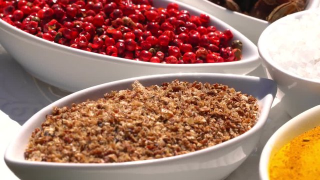 Spices. Various Indian. Spice and herbs rotate. Assortment of Seasonings, condiments. Cooking ingredients, flavor. 4K video Beautiful view
