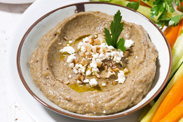mediterranean appetizer - hummus and fresh vegetables, top view