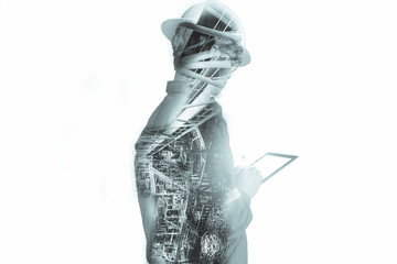 Double exposure of Engineer or Technician man with safety helmet operated platform or plant by...