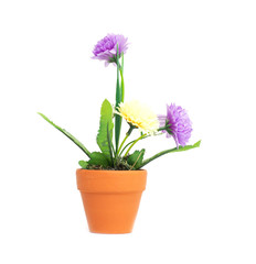 A pot with artificial flowers of purple and yellow chrysanthemums on a white background, isolate