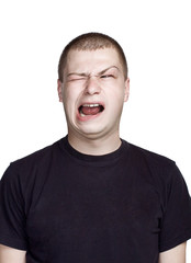 Obraz premium Disgust face with open mouth. Portrait of young man. Facial expression.