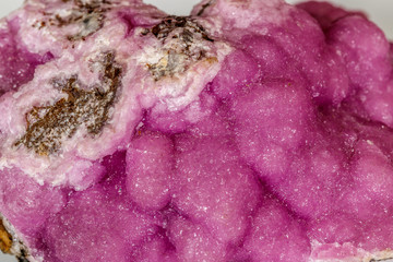 Macro stone cobalt calcite mineral on white background