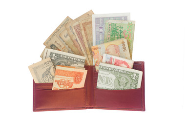 vintage leather wallet full of old money isolated