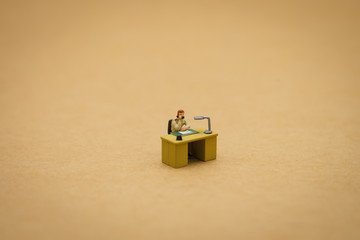 Miniature people businessmen Interview candidates To consider working in the company. The concept used in selecting personnel to participate in the organization. with copy space.
