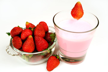 Fresh ripe juicy Strawberry with a glass of strawberry milkshake