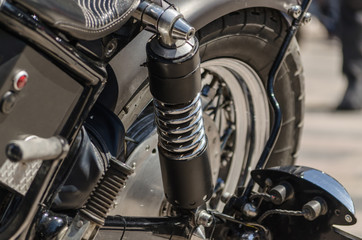 Fototapeta na wymiar bobber chopper motorcycle rear wheel closeup