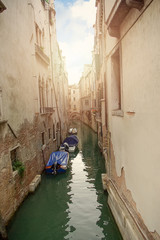 Fototapeta na wymiar Venice, Italy. Venetian canal with boats.