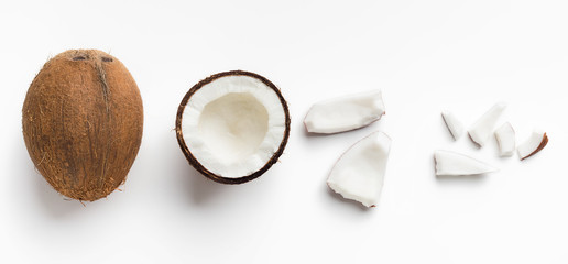 Fototapeta na wymiar Pieces of coconut on white