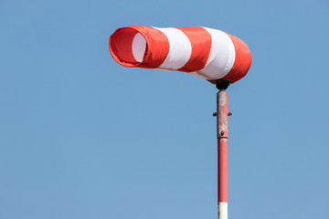 windsock against blue sky