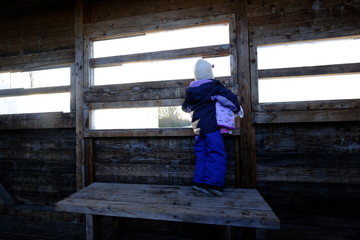 a girl looks into the bright light