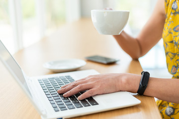 Asian woman working and using laptop