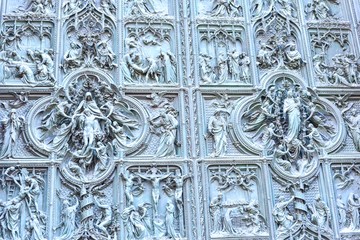 Sculptures on the Main Bronze Door of Duomo di Milano in Milan, Italy