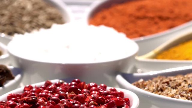 Spices. Various Indian. Spice and herbs rotate. Assortment of Seasonings, condiments. Cooking ingredients, flavor. 4K video Beautiful view