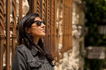 Young indian woman looking aside