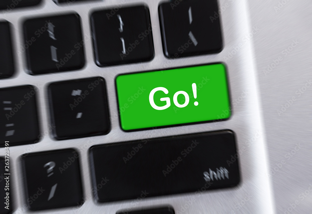 Poster word go! written on green computer button