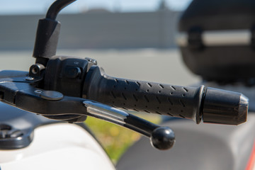 close-up of the gas grip of the motorcycle