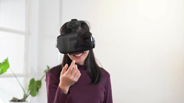 Innovation and technology concept, Woman with glasses of virtual reality at home