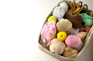 Fototapeta na wymiar Color yarn for knitting, knitting needles and crochet hooks