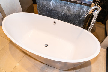 Beautiful luxury white bathtub decoration in bathroom interior