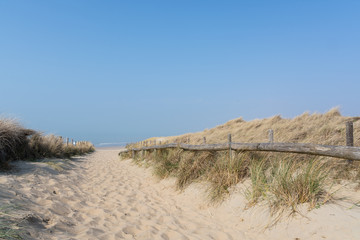 Sandy path to the beach in Noordwijk, The Netherlands