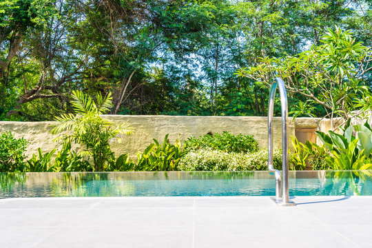 Beautiful landscape outdoor swimming pool in hotel and resort for leisure